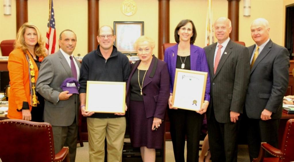 Freeholders present a proclamation declaring November as Pancreatic Cancer Awareness Month in Monmouth County to pancreatic cancer survivor Gregory Stephanides and Jill Rothstein, who lost her father to pancreatic cancer at their Oct. 30 meeting. 
